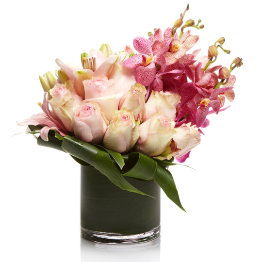 A luxury arrangement of Pink Roses and Pink Orchids- H.Bloom