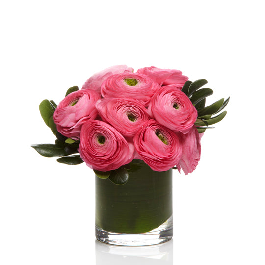 A luxe arrangement of Pink ranunculus and Premium Greenery - H.Bloom
