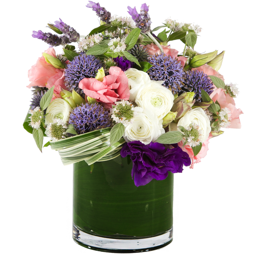 A garden-style mixed arrangement of purple, pink and white blooms with modern greenery.